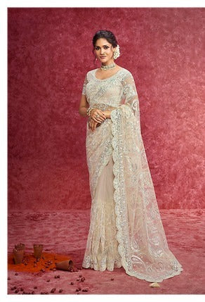 Sulakshmi Ambika Neet Off White Color 4201 Carnival Wear Saree