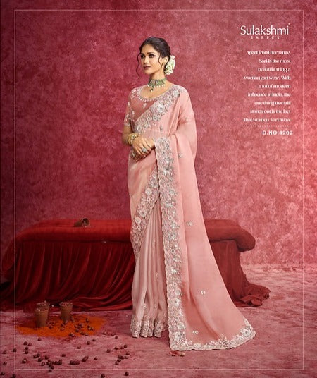 Sulakshmi Ambika Casio Peach Color 4202 Carnival Wear Saree 2025