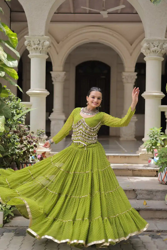 Moni 5047 Parrot Green Color Leheriya Printed Navratri Lehenga Choli Collection